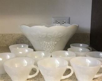 $35 - Milk Glass Punch Bowl and 11 glasses, grape pattern, Bowl 12.5” diameter at top.