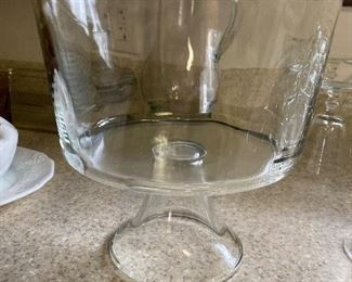 $8 - Trifle bowl glass, bowl is 8.5” wide slightly tapered x 5” tall, height 8 3/4” incl stand Note: There are some small imperfections like scratches on outside of glass