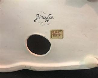 Base of Japanese ceramic giraffes