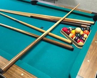 Wolverine Pool Table - in excellent condition, Professional removal required - The table is a DEAL! NOW ONLY $75 and includes all pool cues, balls, and cue rack.   