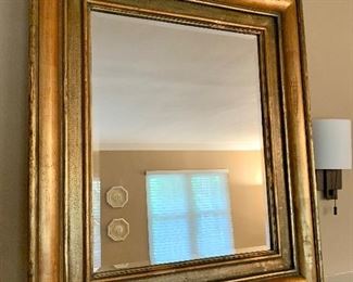 Gold wood framed mirror.  Dimensions: 42"h x 36"w.  PRICE: $250