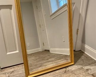 Wood framed mirror.  PRICE $60