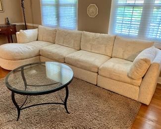 White Sectional sofa.  Down filled cushions.  Additional half moon foot stool not shown.  Manufactured by Freestyle Collection.  Made in USA.                                                 PRICE:  $695  TABLE SOLD