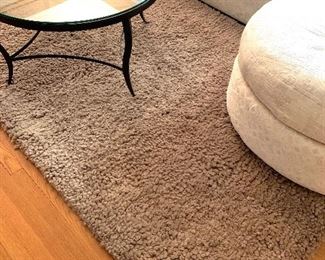 PRICE: $260                                                                                    Crate & Barrel 100% wool taupe shag rug.  Thick pile.  Dimensions 4' x 6'.   No pets, no smoking home.  TABLE SOLD