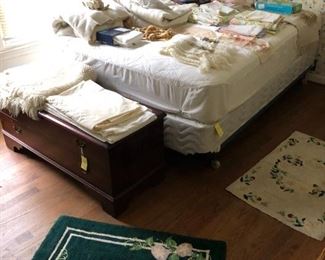 Double bed with mattress/boxspring.