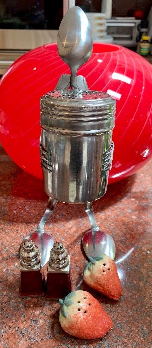Fanciful Sugar Shaker with spoon feet and head, vintage strawberry salt and pepper shakers, and another set of enamelled salt and pepper shakers: $18