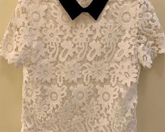 White Lace, short sleeved, black collar, size small: $10