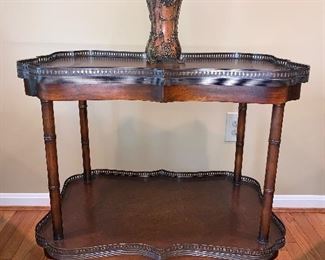 Theodore Alexander leather and metal tiered side table in excellent condition.  29"x20"x30" - Price $450