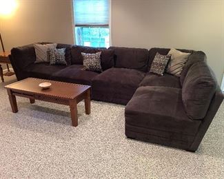 Costco brown sectional sofa in great condition.  Each section measures approximately 39"x71".  Price $975