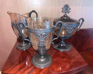 Vintage set of 3 glass and metal urns/pitcher in great condition.  Set $150