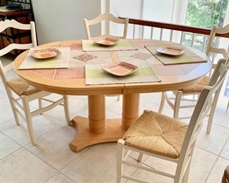 41. Tile Top Dining Table w/ 1 (18'') Leaf (60'' x 42'' x 30'') $ 450.00
42. Set of 6 Side Chairs w/ Rush Seat (17'' x 16'' x 38'') $ 150.00