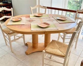 41. Tile Top Dining Table w/ 1 (18'') Leaf (60'' x 42'' x 30'')	 $ 450.00 
42. Set of 6 Side Chairs w/ Rush Seat (17'' x 16'' x 38'')	 $ 150.00 