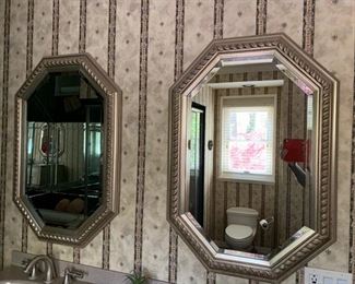 129. Pair of Beveled Hexigon Framed Mirrors AS IS (26'' x 38'')	 $ 250.00 