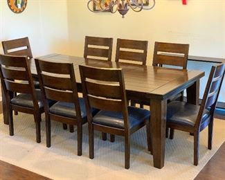 Espresso Rustic Dining Table w/ 8 Chairs	Table: 30x43x72-90in.  Chairs: 40x22x21in seat: 19in	HxWxD