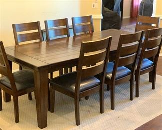 Espresso Rustic Dining Table w/ 8 Chairs	Table: 30x43x72-90in.  Chairs: 40x22x21in seat: 19in	HxWxD