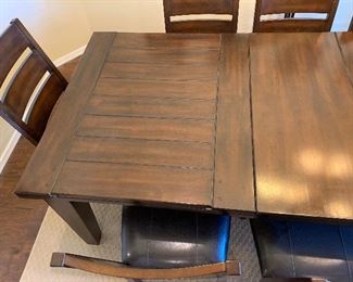 Espresso Rustic Dining Table w/ 8 Chairs	Table: 30x43x72-90in.  Chairs: 40x22x21in seat: 19in	HxWxD