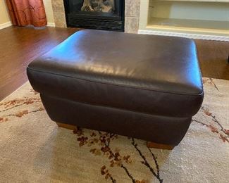 Mocha colored leather ottoman	
