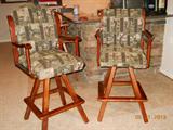 5 captain, swivel bar stools; one slightly different captain swivel game chair.