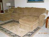 Beautiful Lazy Boy sectional sofa, and area rug.