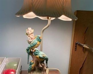 Pair of porcelain bird motif lamps $125
