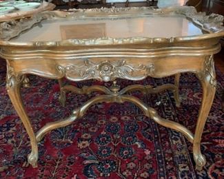 Tea tray marquetry table. Measures 20" high by 31 1/2" long by 21" wide.  $125