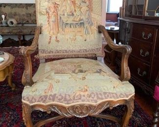 Italian, late 19th century, carved armchair with elaborate tapestry back and seat. Measures 46 1/4 inches high by 26 1/2 inches wide by 31 inches front to back - $400