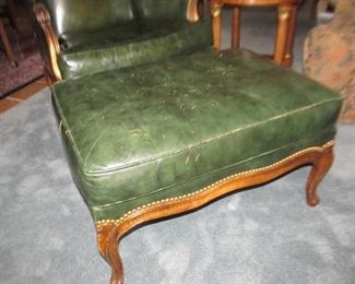 116  Ottoman in green leather