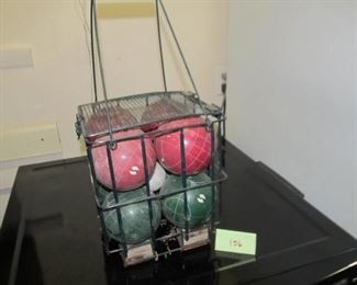 156 Bocce ball set in holder. $20