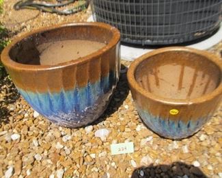 224   Pair of pottery pots (large one w/ crack) $10