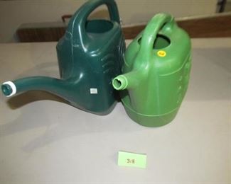 318 Pair watering cans $2