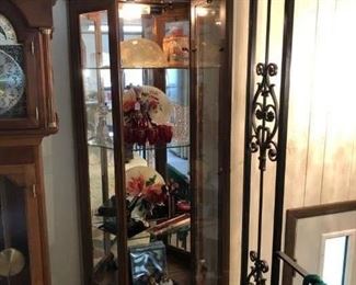Glass Curio Cabinet lighted top and bottom.  $140.00
