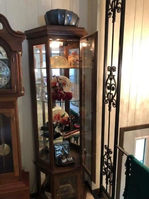 Glass Curio Cabinet lighted top and bottom.  $140.00