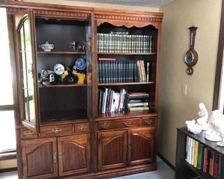 Two Book Cases.   One has glass doors, the other is open.  Drawers and cabinets on bottom.   $399.00 Each or both for $600.00   Brand is HOOKER.