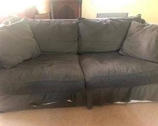 large sofa, very comfortable, color is green chintz type fabric