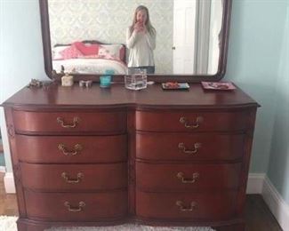 Dresser with mirror to match full-size bed.