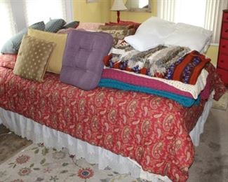 Bed, blankets, throw pillows