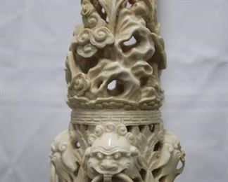 Highly carved top piece.