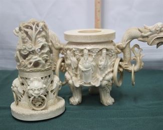 Two piece faux ivory decorative piece.