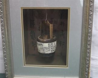 50% OFF, now $23.                                                                          
$45. Framed shadow box with hanging water carrier. 