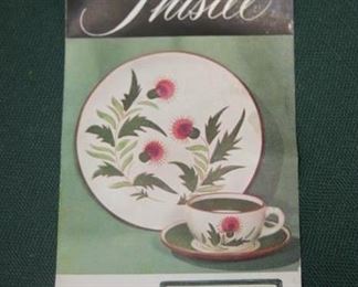 $150.  Stangl "Thistle" #3847. 73 pieces. As is. Some dinner plates have yellowing. 