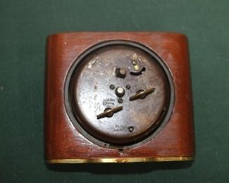 $20. Seth Thomas, wood and brass framed clock. 3.5x4.5 inches.
