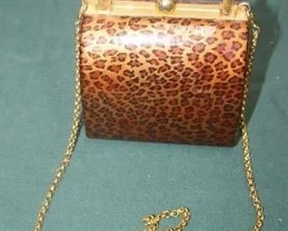 50% OFF. NOW $5.                                                                         $10. leopard print purse.
