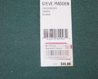 50% OFF. NOW $12.50.                                                               $25. Steve Madden zebra print calf hair shoulder bag.