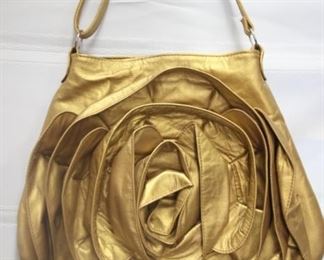 50% OFF, now $10.                                                                          
$20.  Rose themed, gold leather shoulder bag.