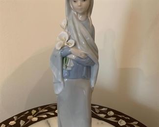 HALF OFF!   $20.00 now, was $40.00.....Lladro Lady With Lilies Excellent Condition