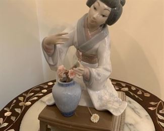 REDUCED!  $25.00 now, was $50.00....Lladro Geisha Lady arranging flowers, as is, partial loss of flowers...