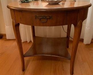 HALF OFF!   $100.00 now, was $200.00......Vintage Milling Road Furniture for Baker, Round Table, One Drawer and  bottom shelf, believe to be walnut. Excellent Condition.  