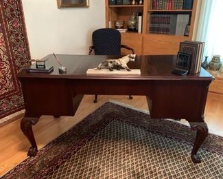 REDUCED!  $400.00 now, was $900.00.......Hekman Furniture Writing Desk Chippendale Style Leather Topped Desk.  Beautiful Solid Wood with 4 Drawers carved ball claw feet.  58"w x 28 1/2" D x 30" Tall... like new condition!  Chair included!  