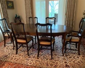 HALF OFF!  $450.00 now, was $900.00 for Queen Ann Style Dining Table, 4 Side Chairs and Two Arm Chairs. Table has Mahogany Finish, Chairs in Ebony finish.  Table Measures 61" without Leaves.  Leaf Measures 24".  