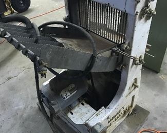 "Midget" Automatic Bread Slicer and it works.